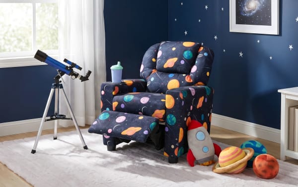 Children’s fabric recliner chair with colorful space-themed upholstery, padded armrests, and built-in cup holder, designed for comfort and play.